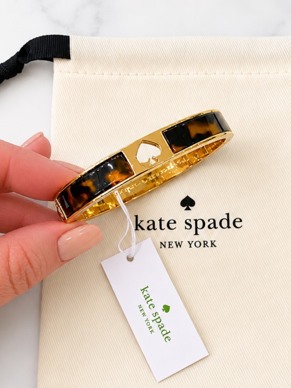 KATE SPADE Tortoise Inlaid Hole Punch Spade Hinged Bracelet